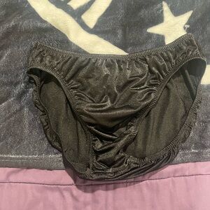 Andreas Cahling black posing trunks